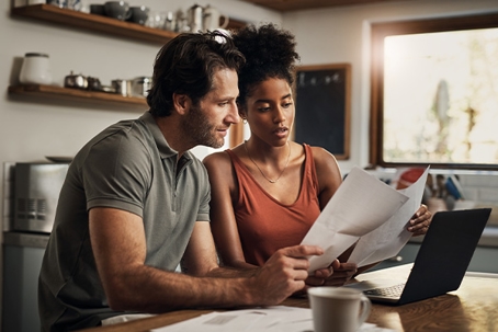 A couple using the computer